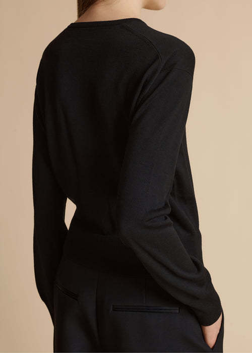 Khaite Long-sleeved Knitted Cardigan In Black
