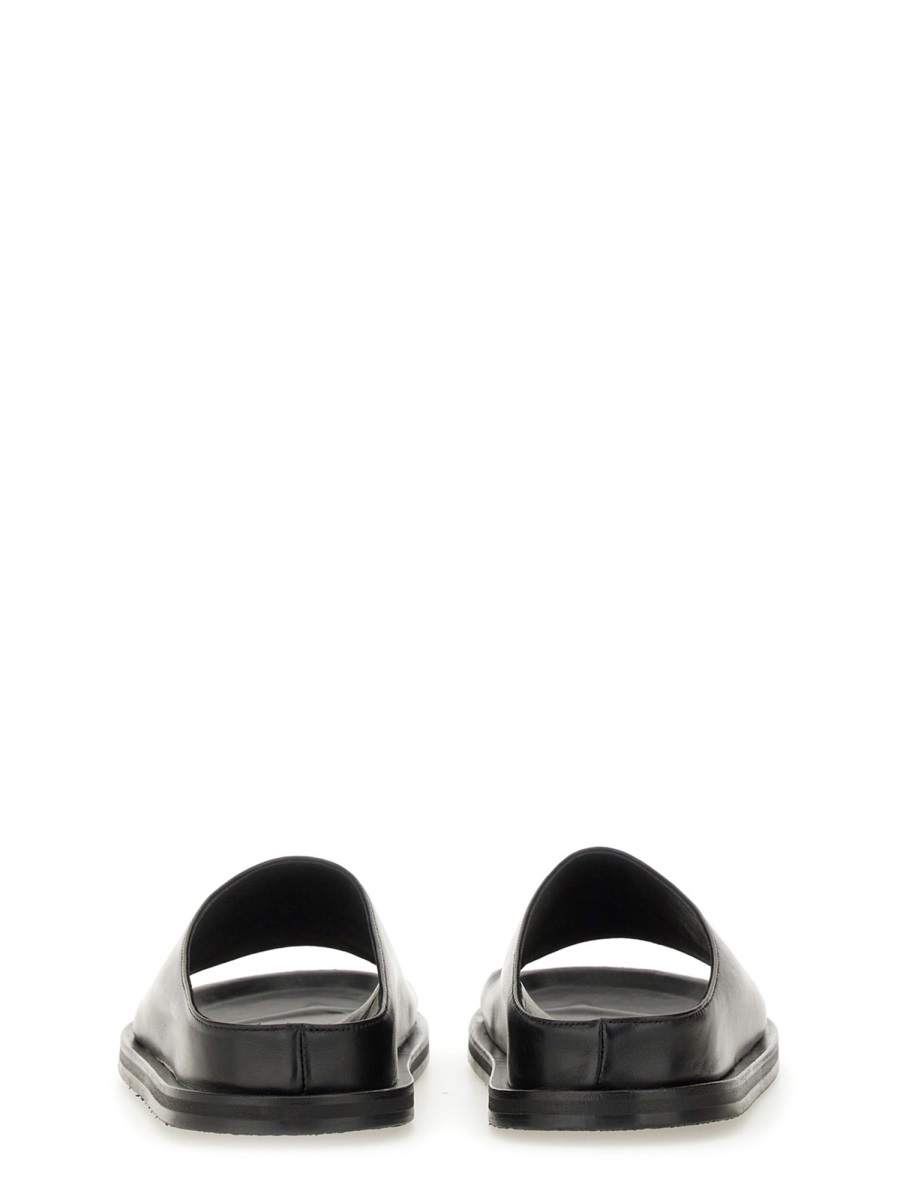 Studio Nicholson Minimalist Slide Flat Shoes In Black