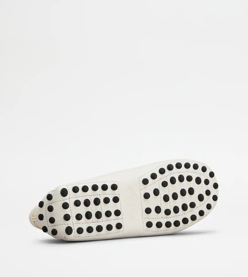 Tod's Gommino Embossed Slip-on Loafers In White