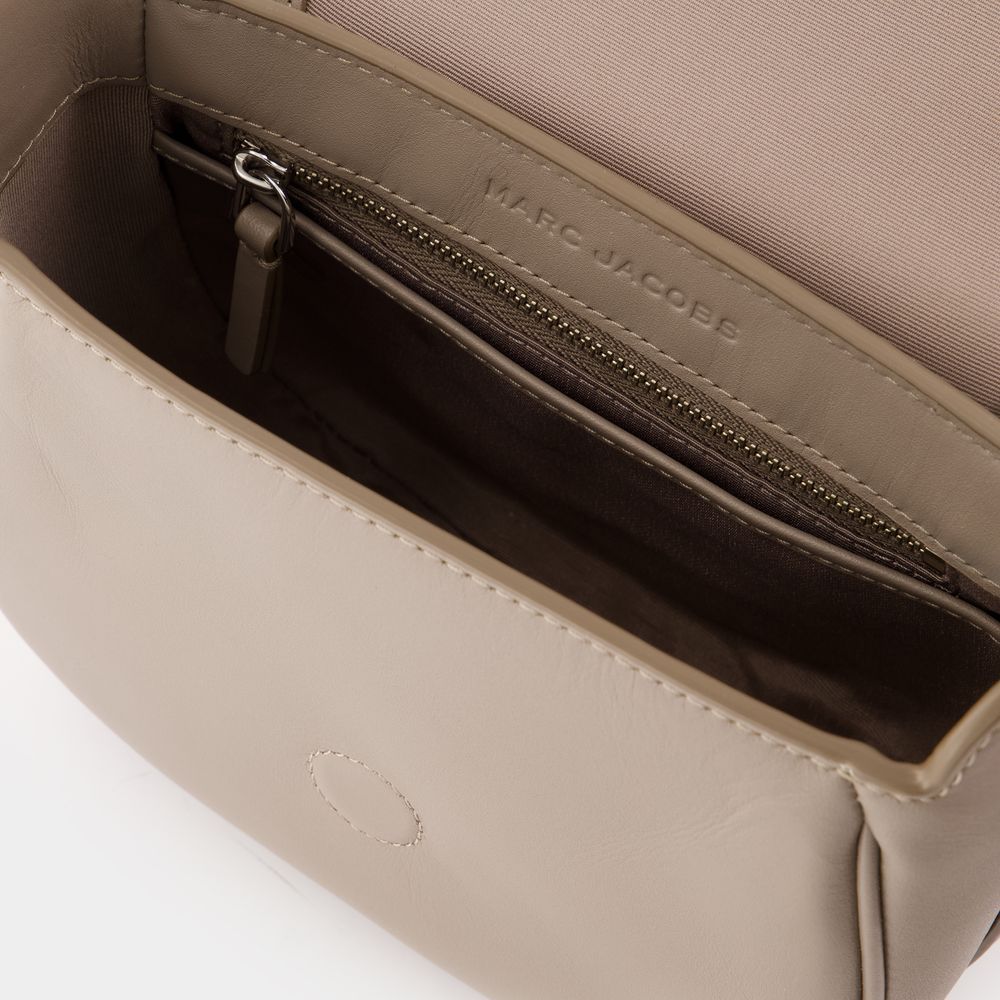 Shop Marc Jacobs The Covered J Marc Saddle Bag In Brown