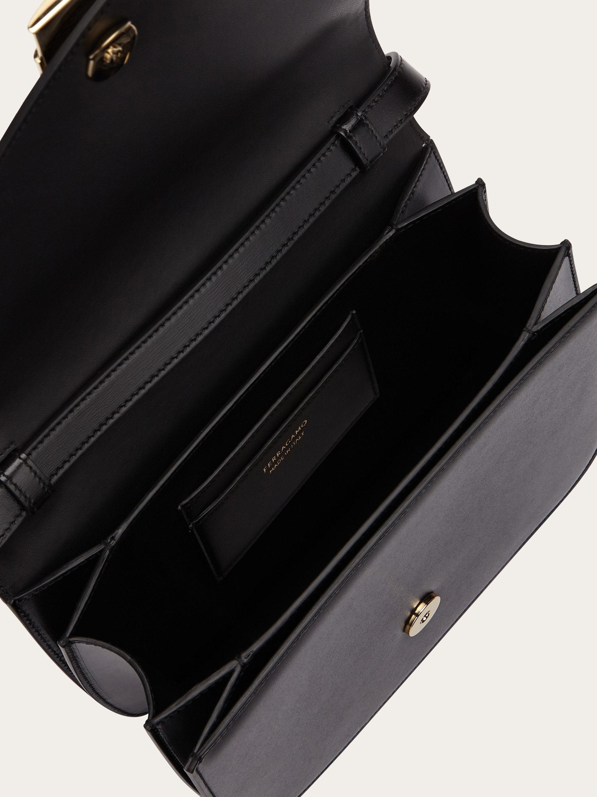 Shop Ferragamo Asymmetrical Front Flap Shoulder Bag In Black