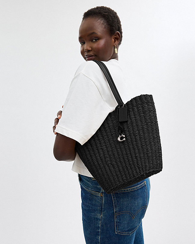 Shop Coach Small Straw Tote Bag In Black