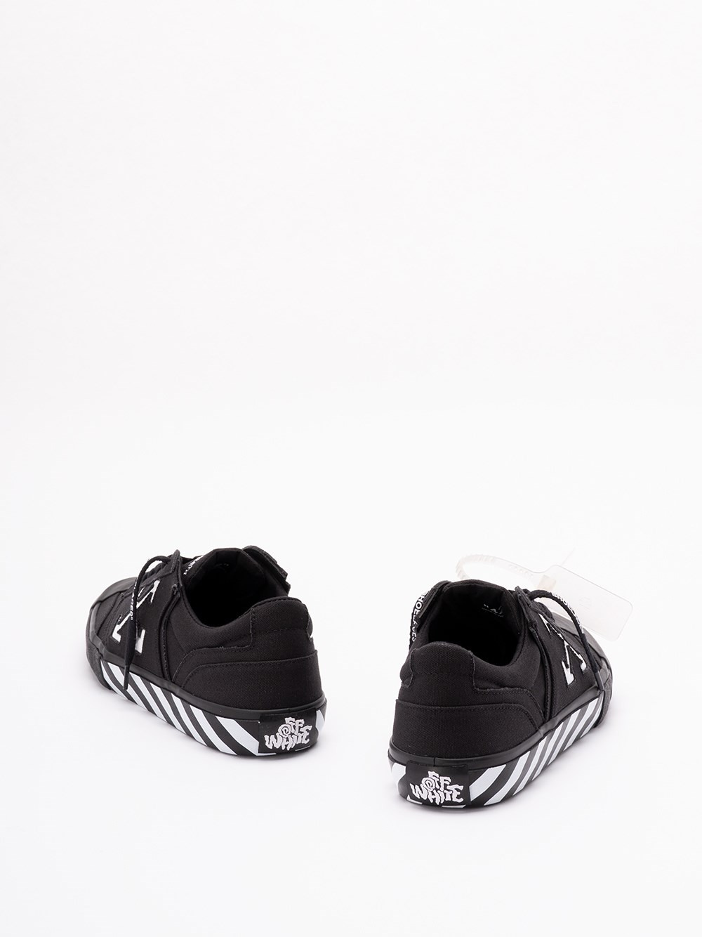 Off-white Low-top Canvas Sneakers Featuring Contrast Stripe In Black