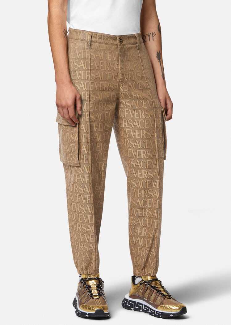 Versace Allover Logo-print Cargo Trousers In Brown