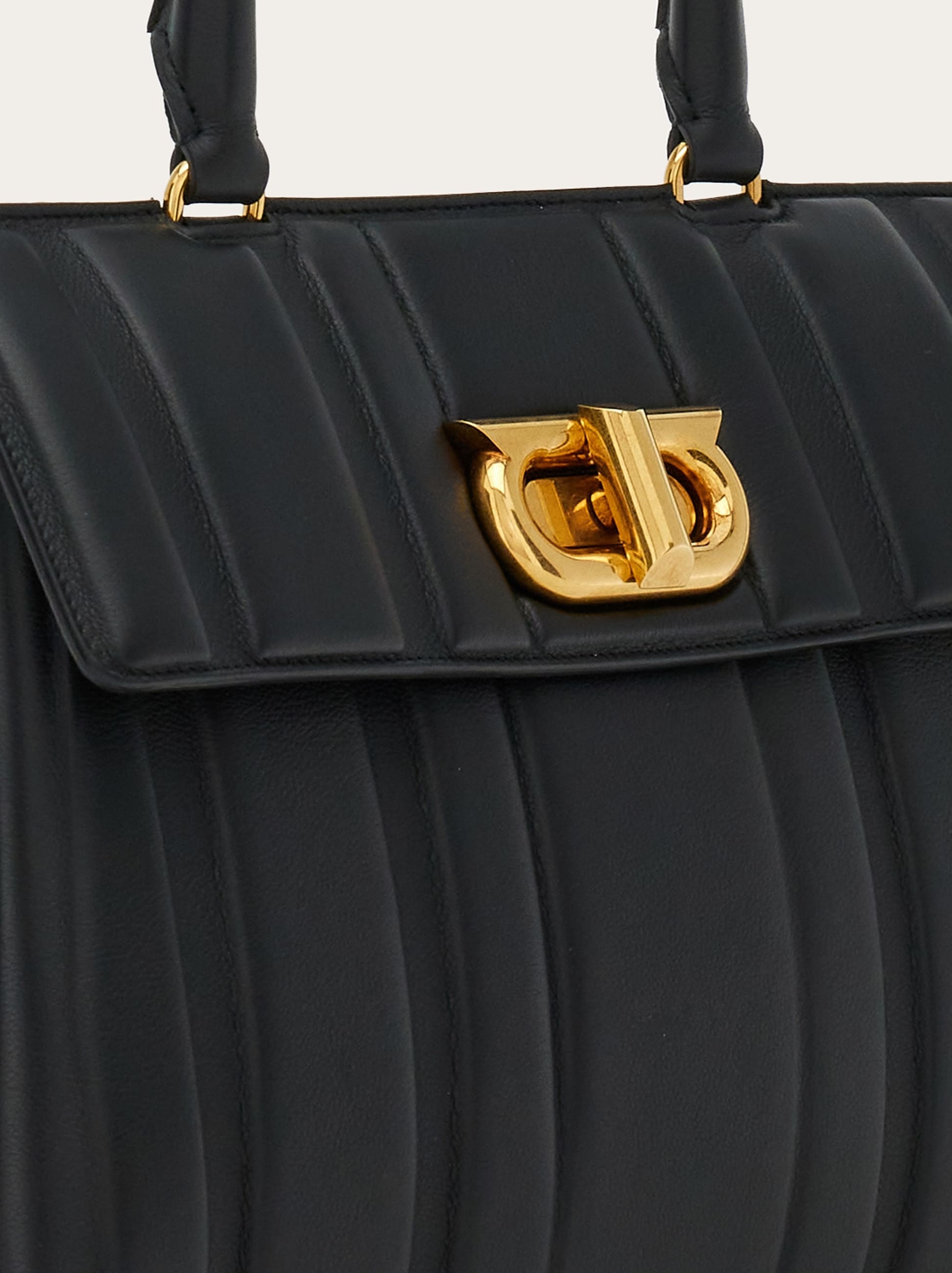 Ferragamo Flip Shoulder Bag In Black