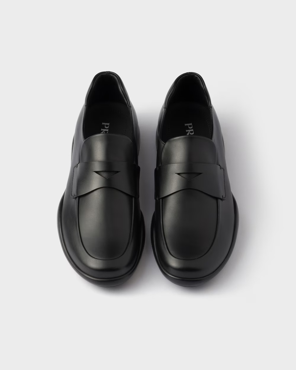 Prada Toblach Leather Loafers In Black