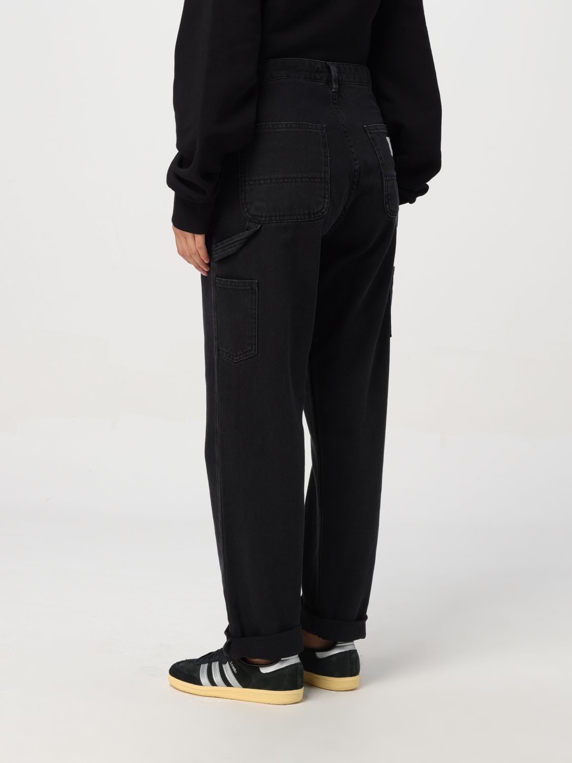 Shop Carhartt Mid-rise Tapered-leg Jeans In Black