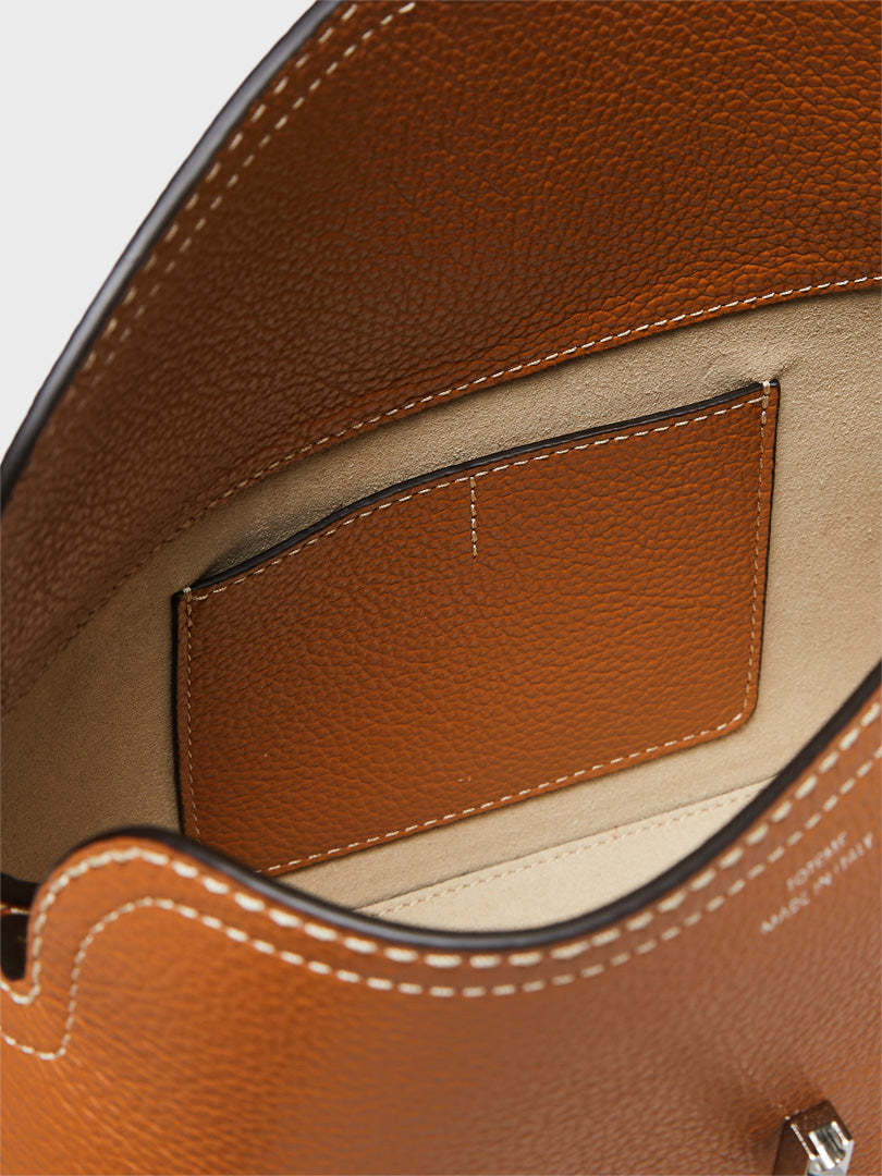 Totême T-lock Top Handle Bag In Pebble Grain Leather In Orange