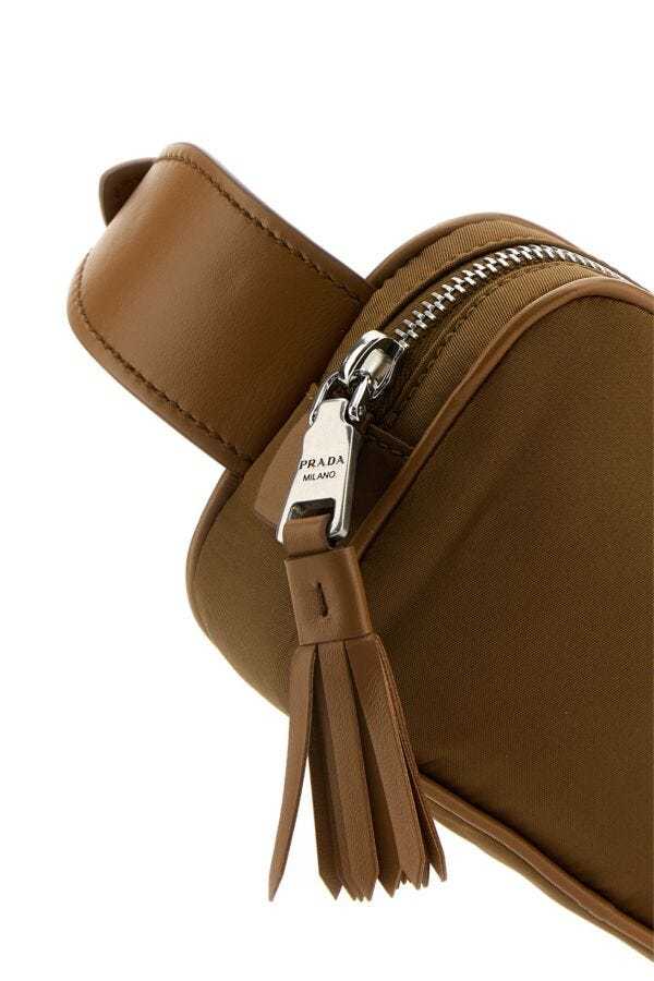 Shop Prada Logo Plaque Belt Bag In Brown