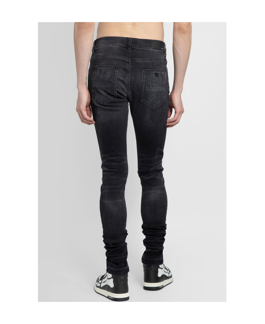 Shop Amiri Distressed Skinny Jeans In Black