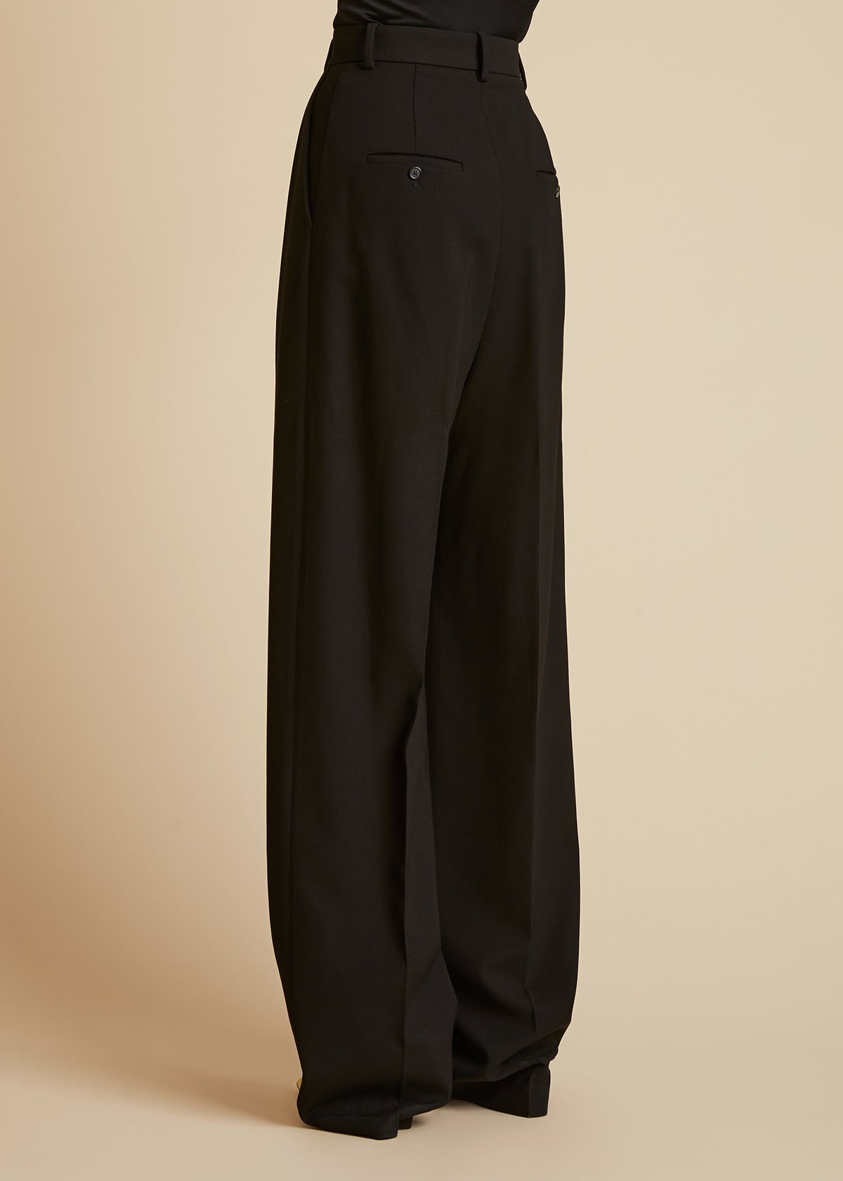 Khaite Cessie Pleated High-waisted Trousers In Black
