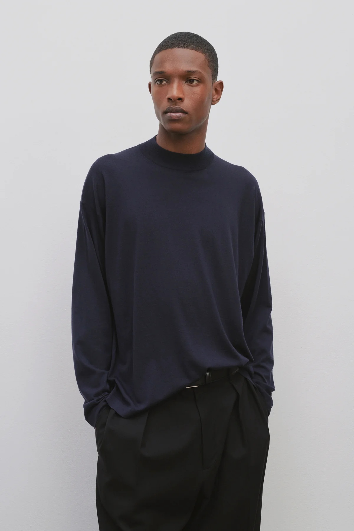 The Row Delsie Wool Small Turtleneck Sweater In Black