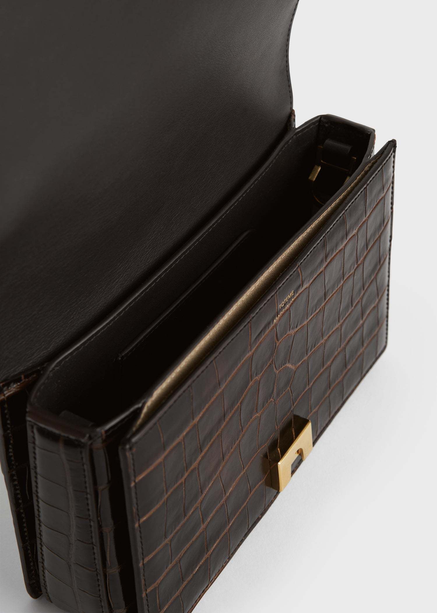 Totême Mini T-flap Embossed Handbag In Black