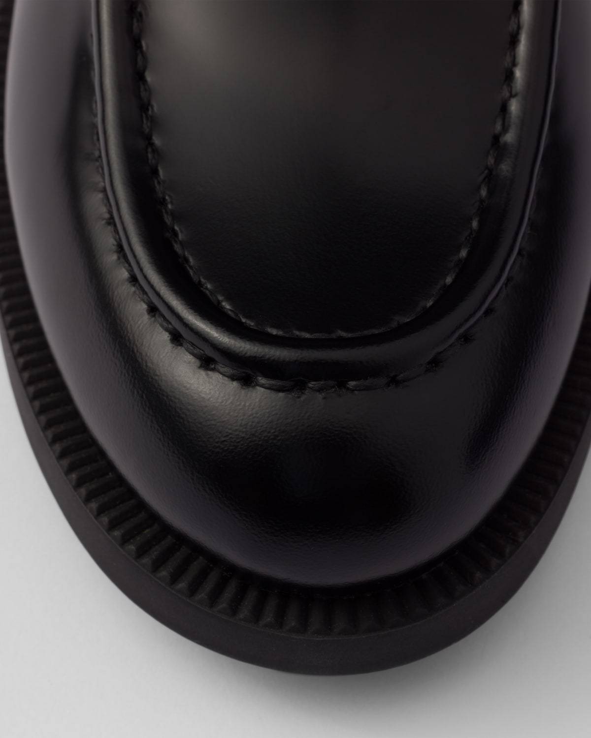 Prada Logo-plaque Leather Loafers In Black