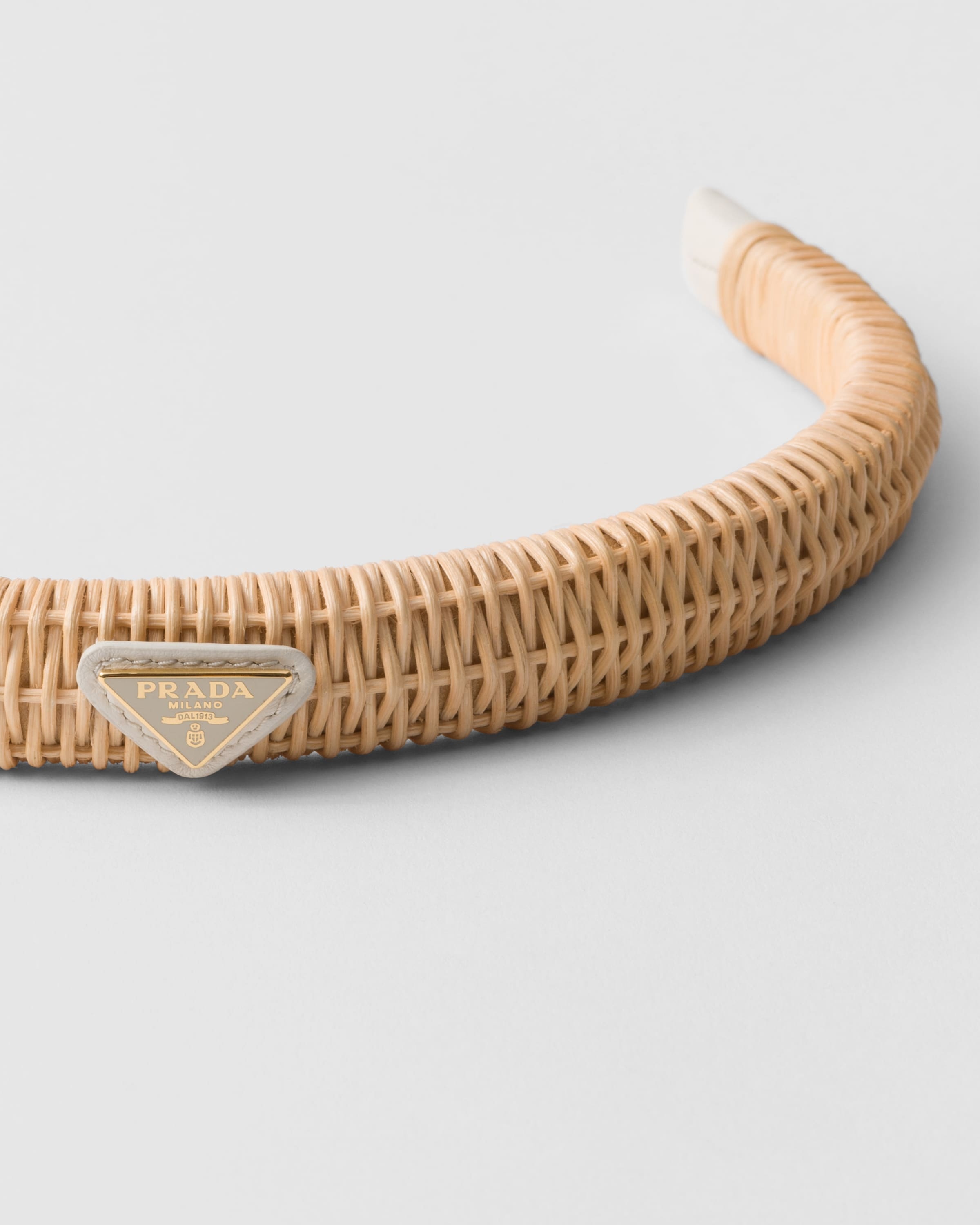 Prada Triangle-logo Interwoven Headband In Yellow