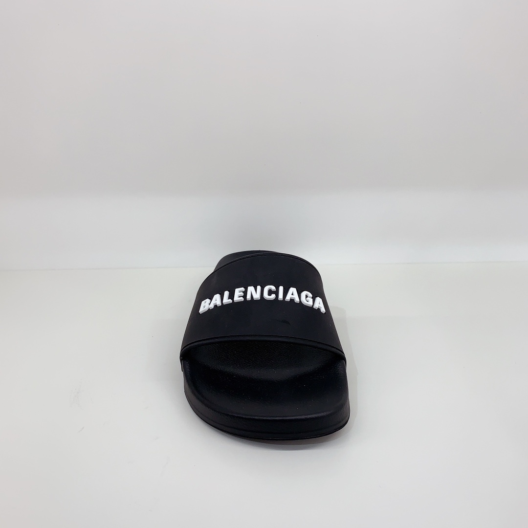 Balenciaga Logo-embossed Pool Slides In Black