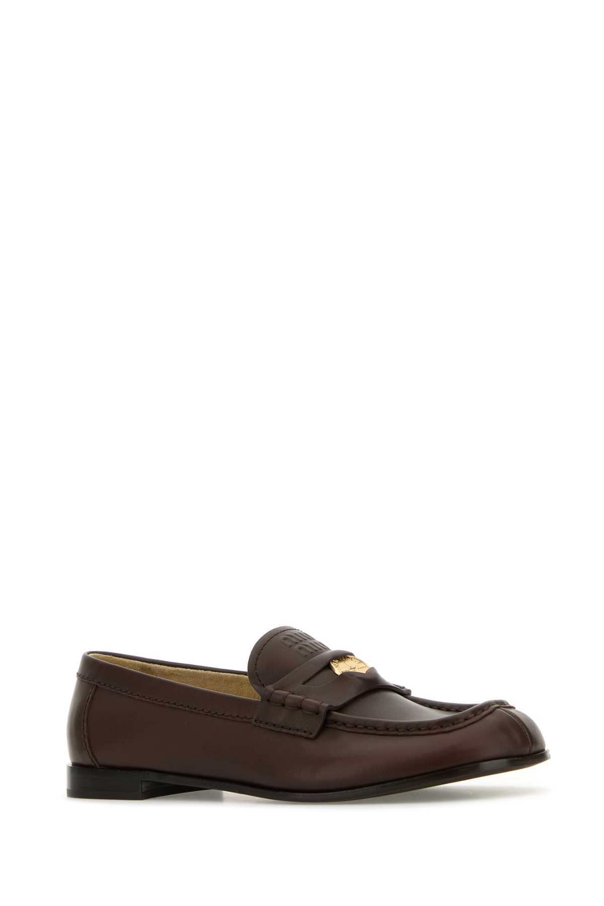 Miu Miu Leather Penny Strap Round Toe Loafers In Black