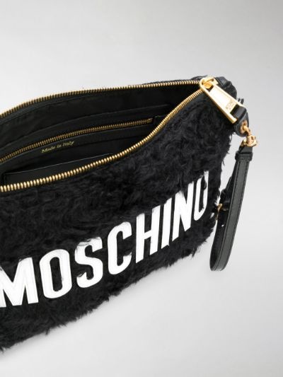 Moschino Logo Clutch In Black