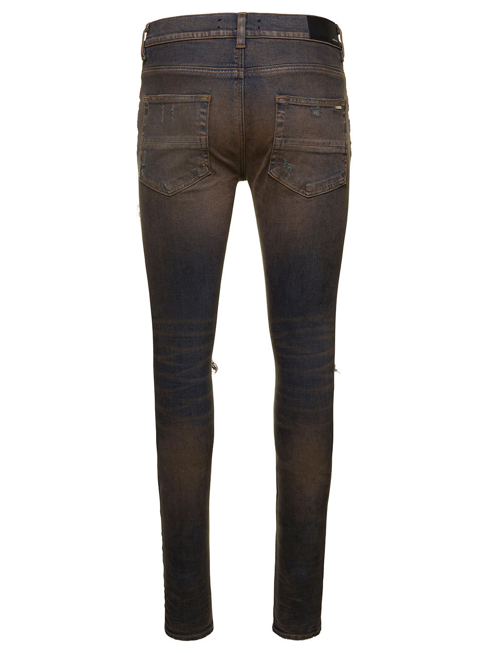 Amiri Ripped Jeans In Black