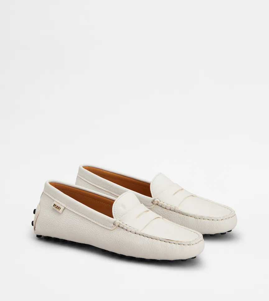 Tod's Gommino Embossed Slip-on Loafers In White
