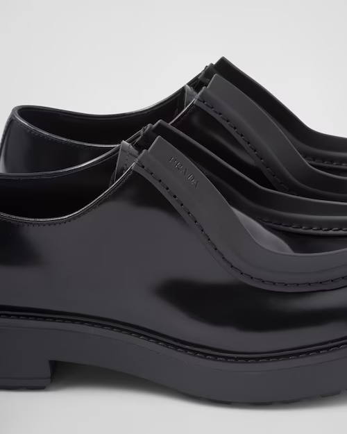 Shop Prada Opaque Brushed Leather Lace-up Shoes In Black