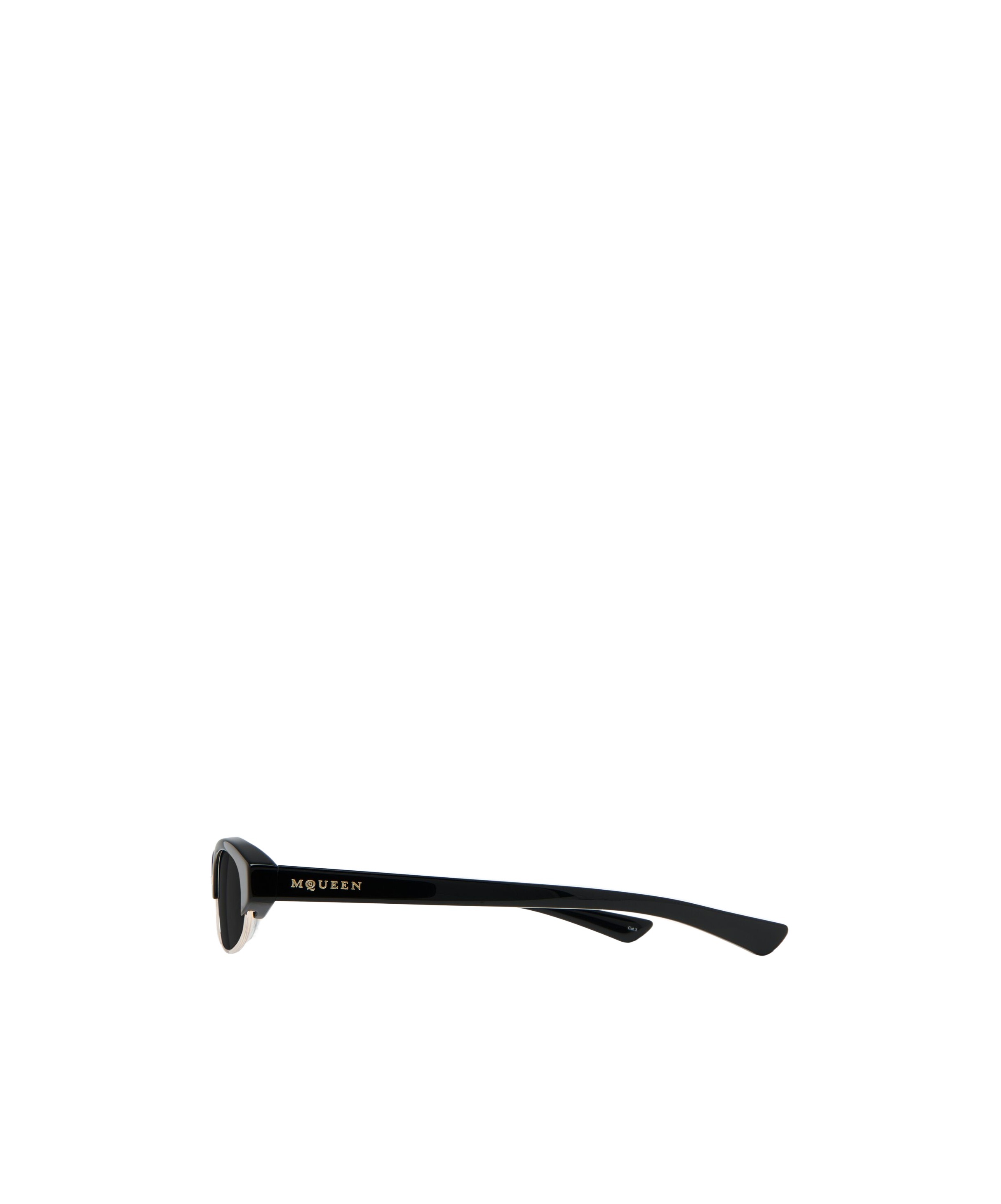 Alexander Mcqueen Oval Sunglasses In Black
