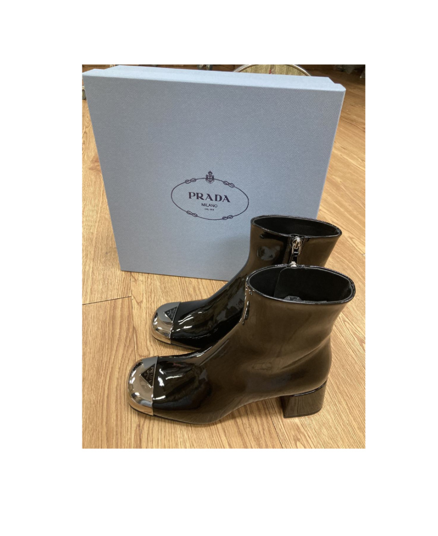 Prada Triangle Logo Plaque Boots In Black