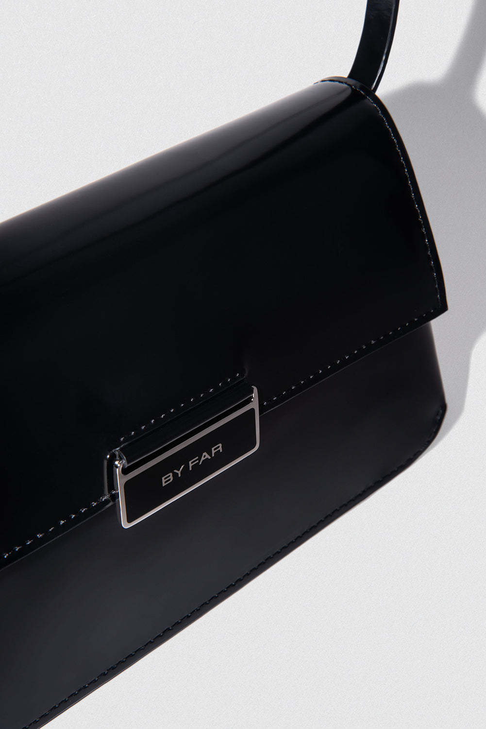 Shop By Far Flip Shoulder Bag In White