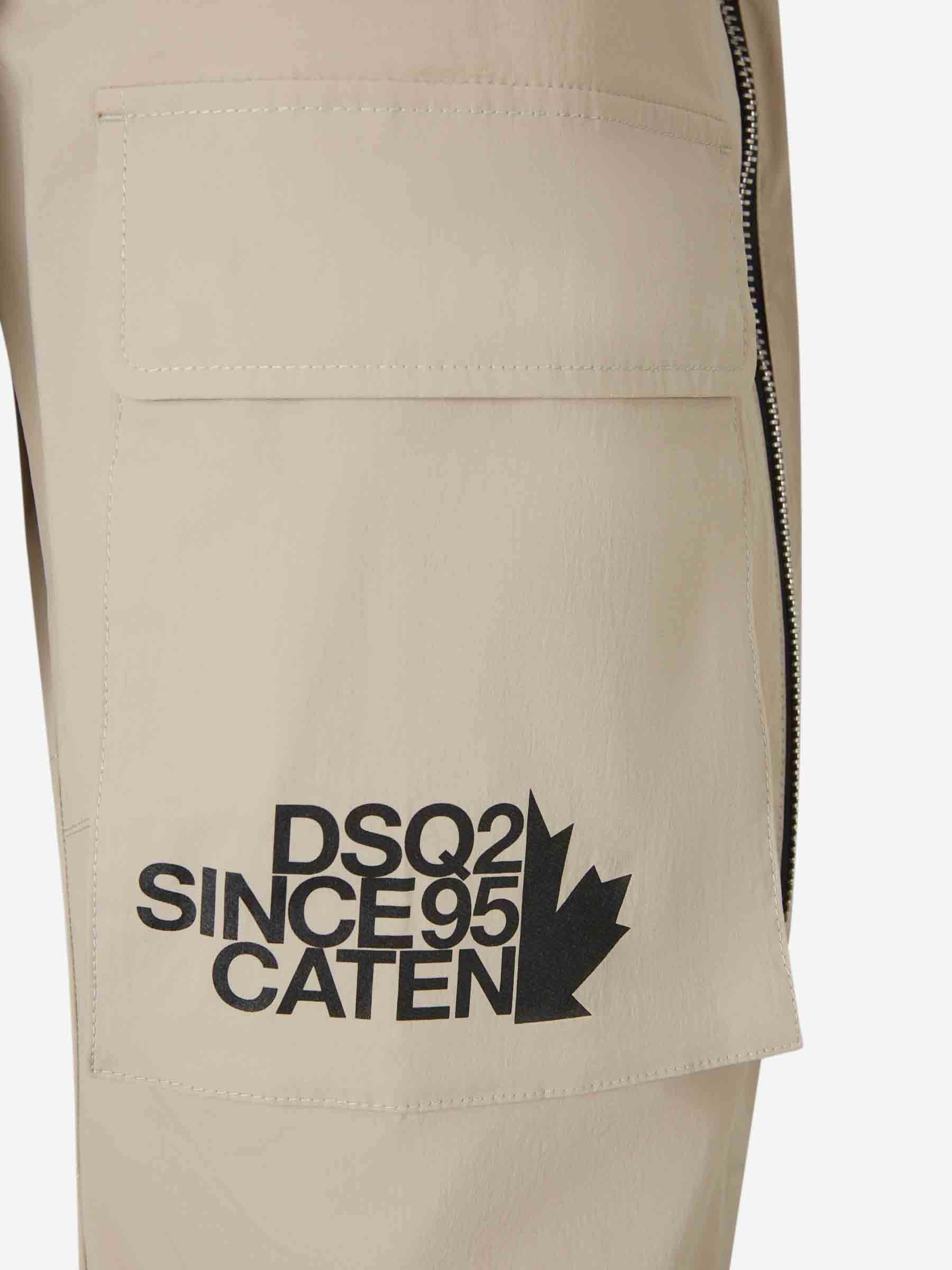Dsquared2 Logo Printed Tapered-leg Trousers In Neutral