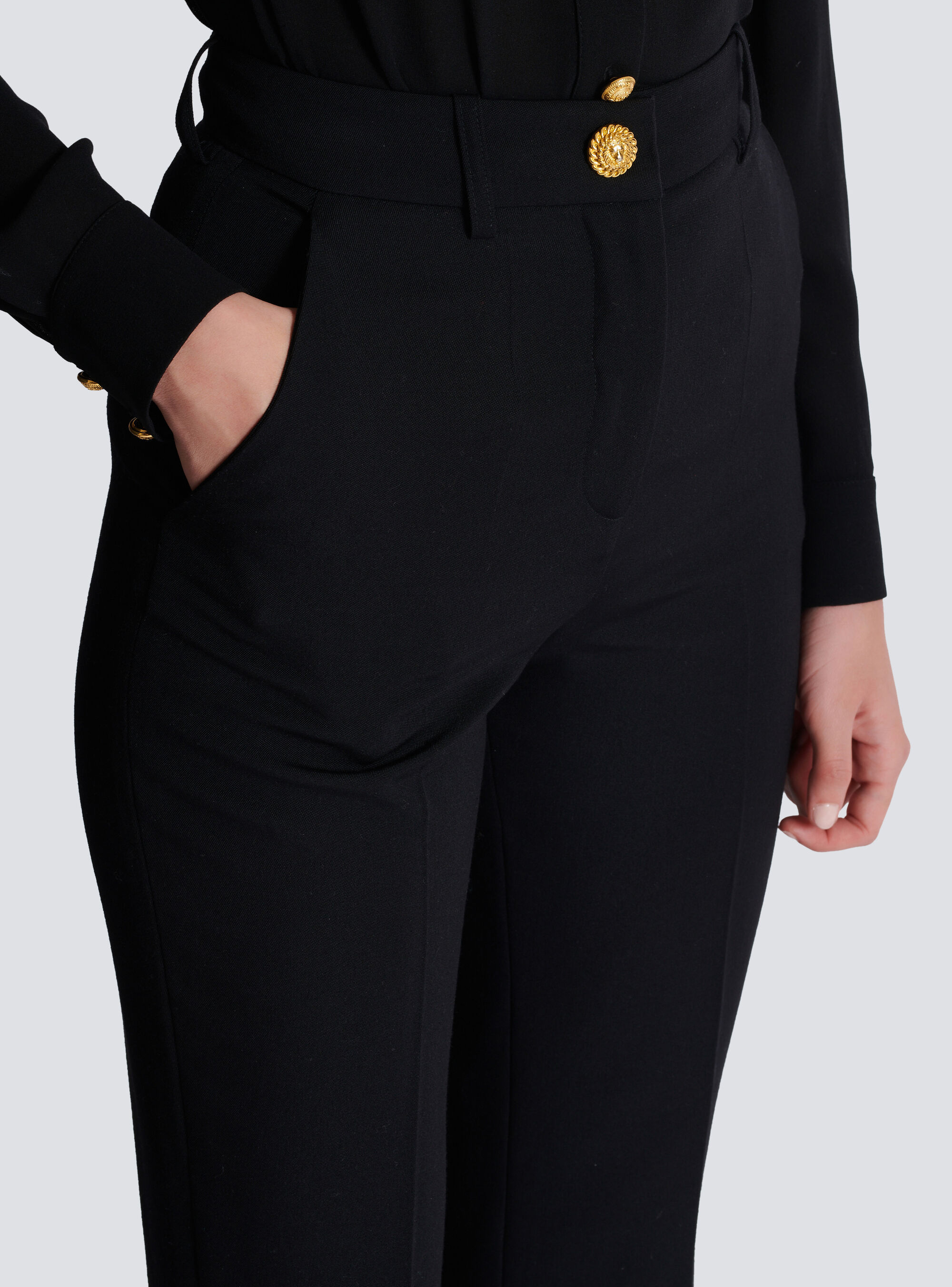 Balmain Flared Virgin-wool Trousers In Black