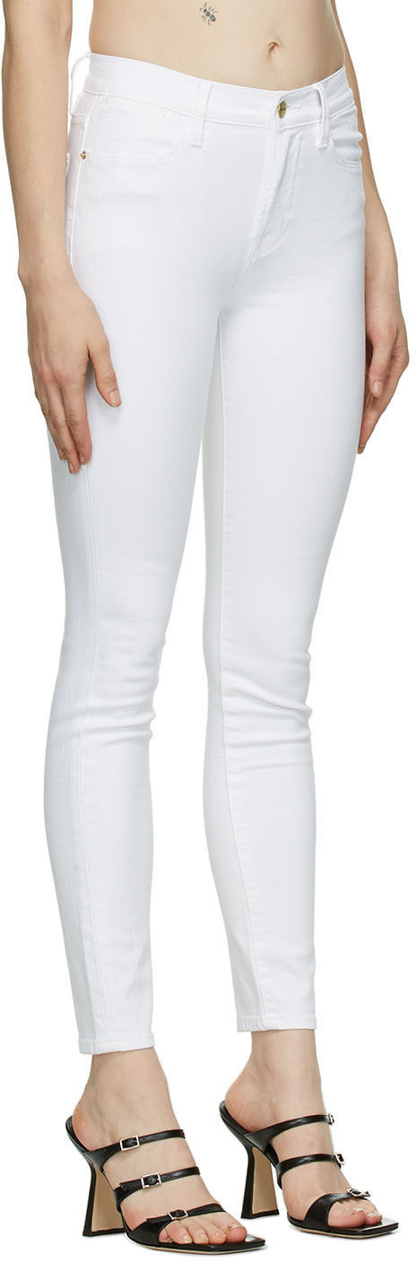Shop Frame High-rise Skinny Jeans In White