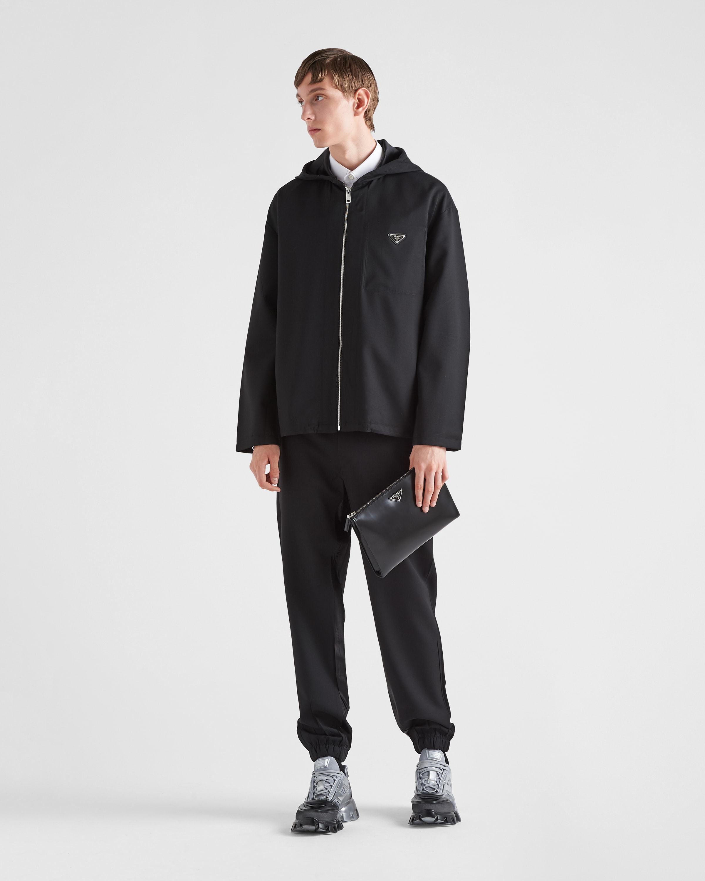 Prada Logo-plaque Tailored Trousers In Black