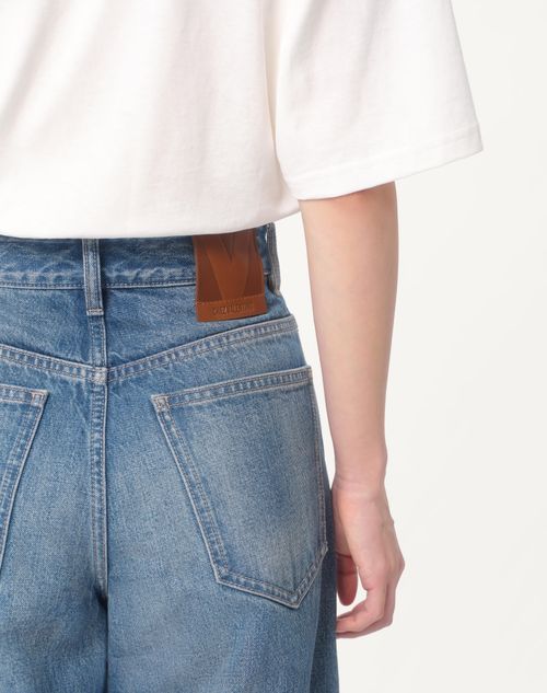 Valentino Garavani Light Blue Jeans With Logo Patch On The Back And Jacquard Cuffs In Denim Woman In Blue