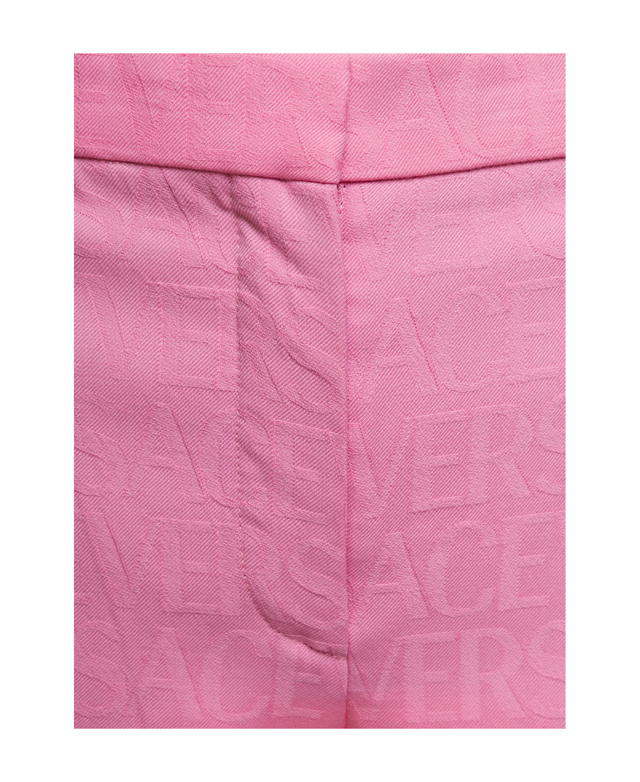 Versace Pink Flare Pants With Tonal Logo Lettering In Wool Woman In Pink