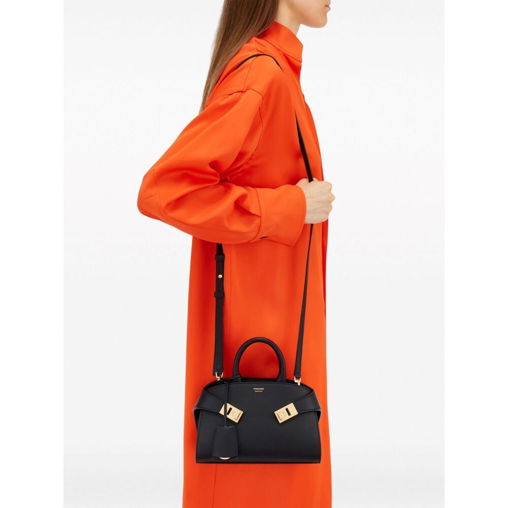 Shop Ferragamo Salvatore Mini Hug Top Handle Bag In Black