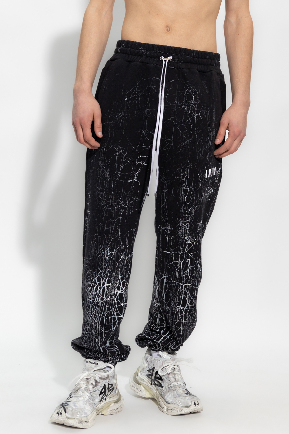 Amiri Cracked-dye Logo Track Pants In Black
