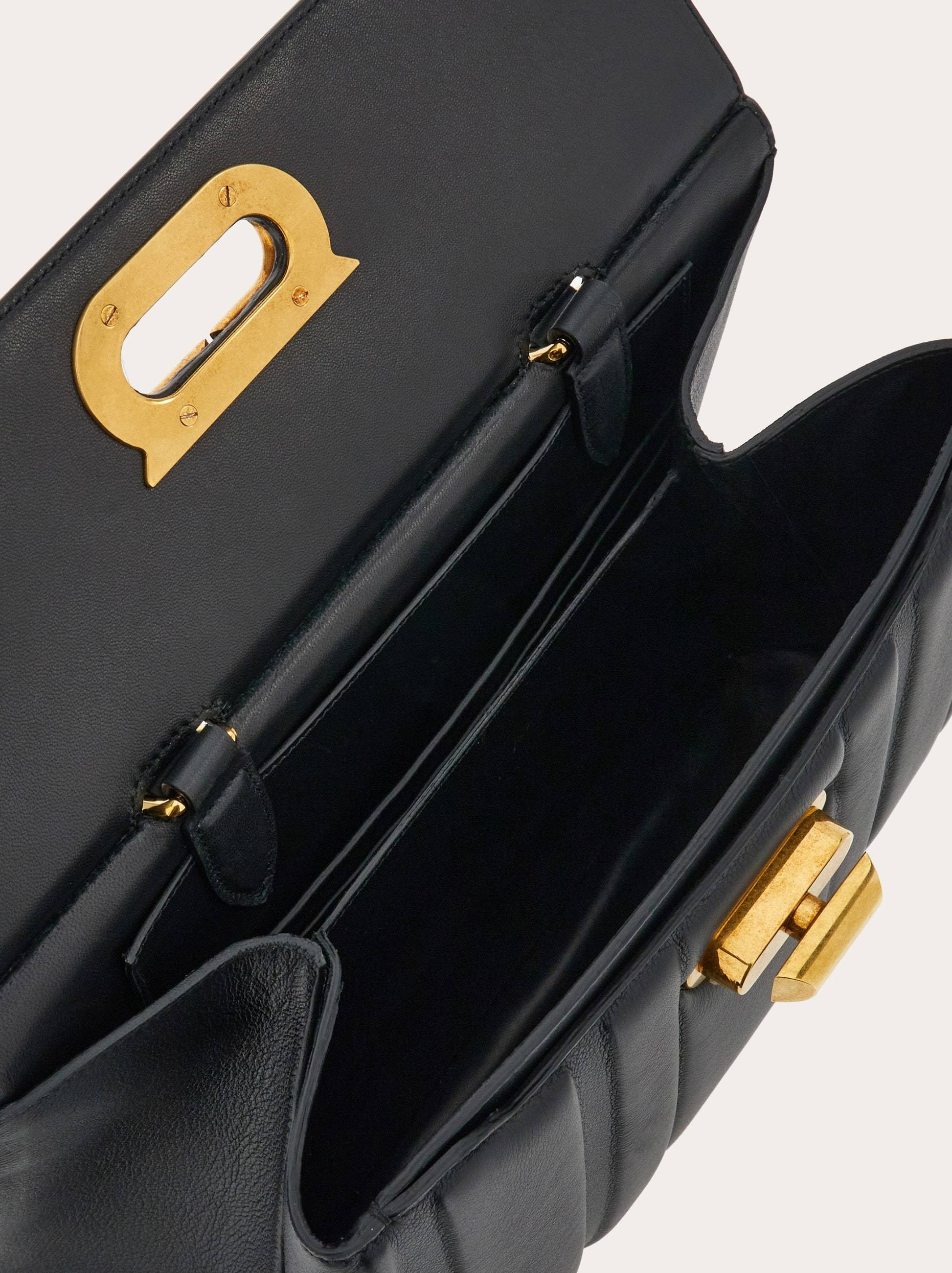 Ferragamo Flip Shoulder Bag In Black
