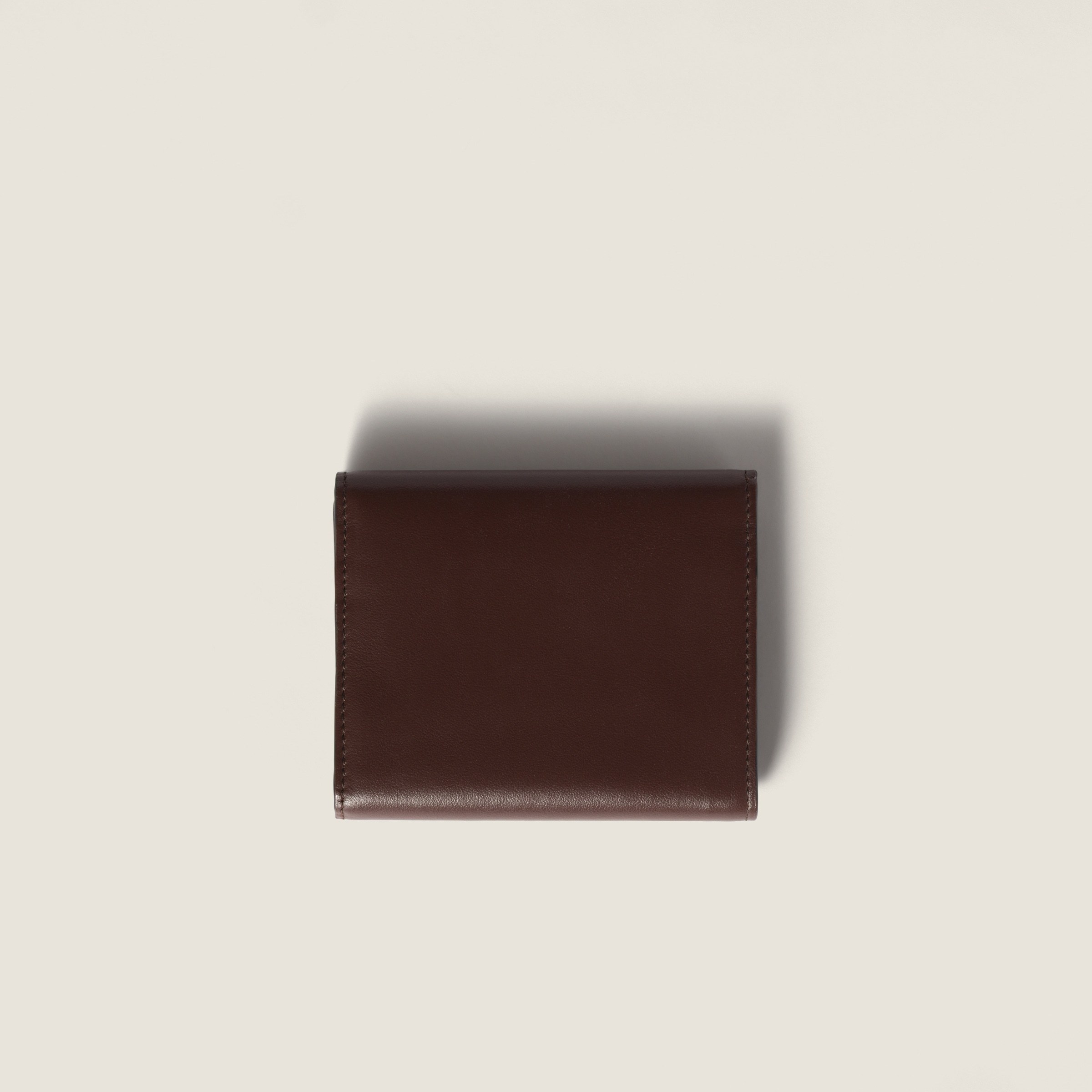 Miu Miu Compact Leather Wallet Fold-over Flap In Brown