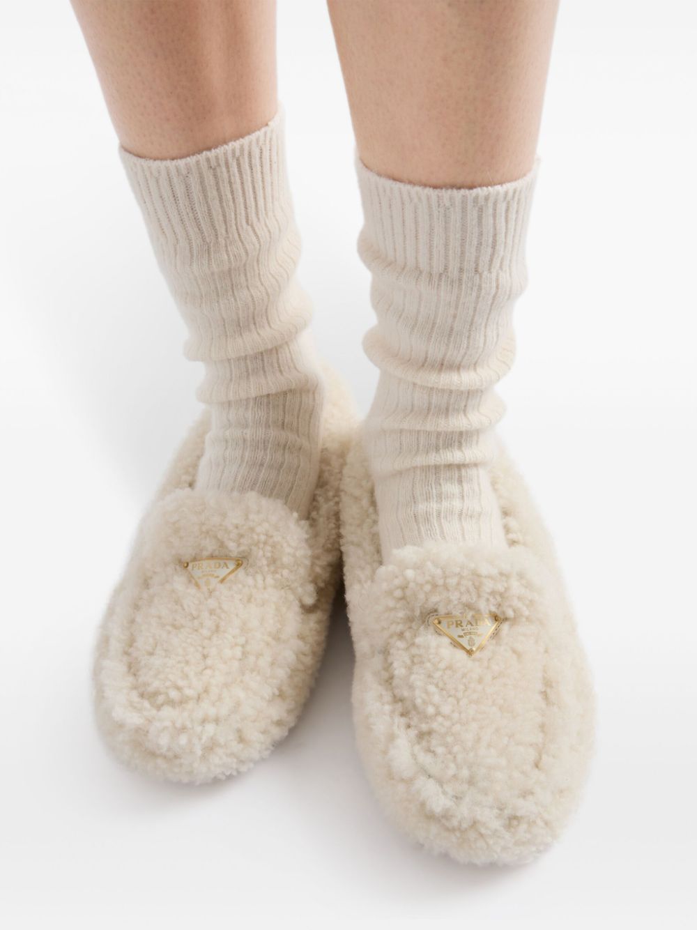 Prada Triangle Logo Shearling Loafers In Nude