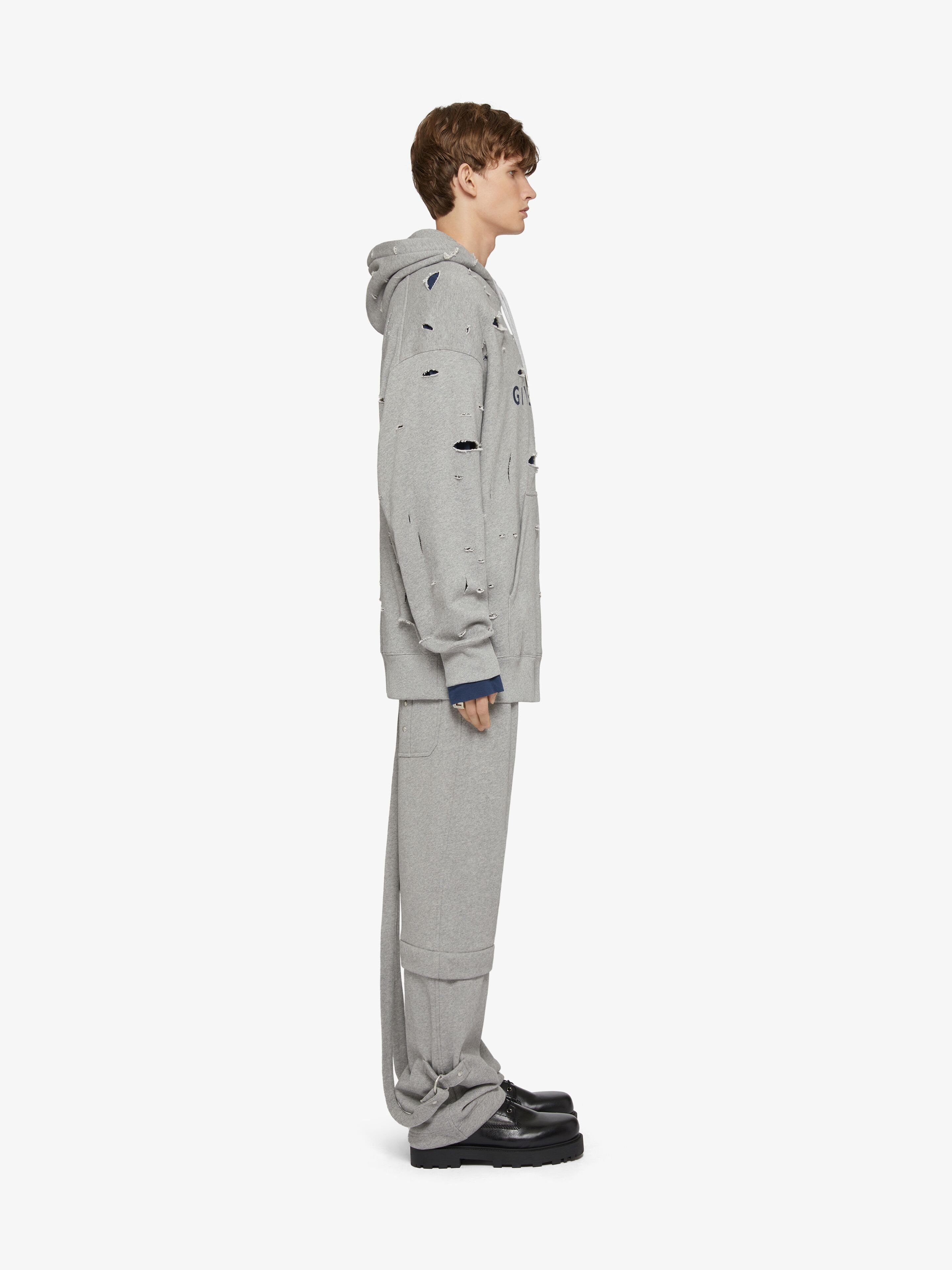 Givenchy A Hooded Sweater With A Broken Hole In Gray