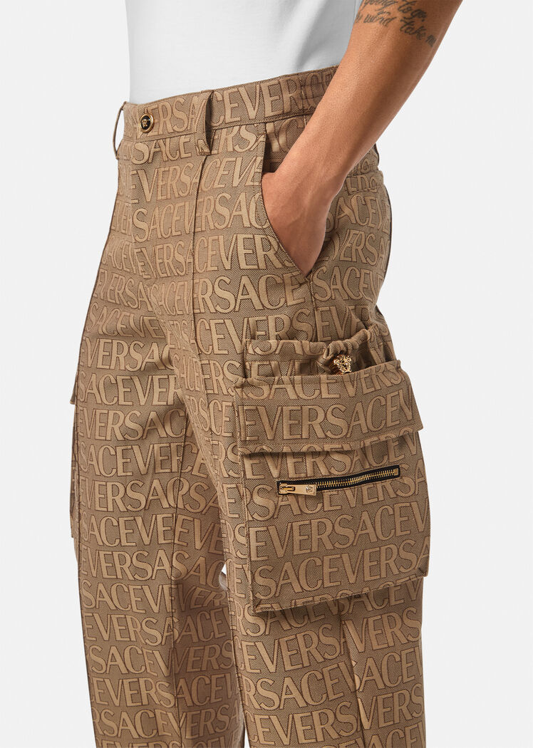 Versace Allover Logo-print Cargo Trousers In Brown