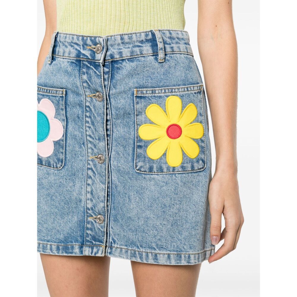 Shop Moschino Floral-patches Denim Miniskirt In Blue