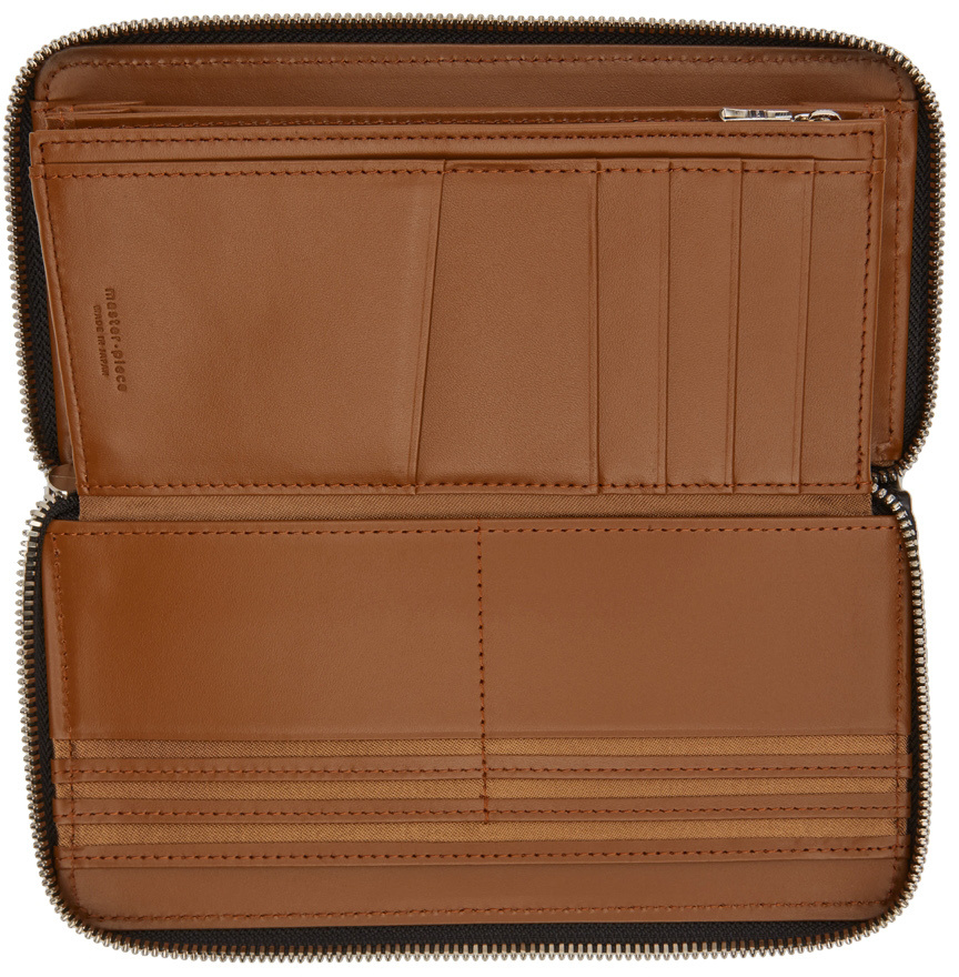 Master-piece Logo Embossed Zipper Wallet In Black