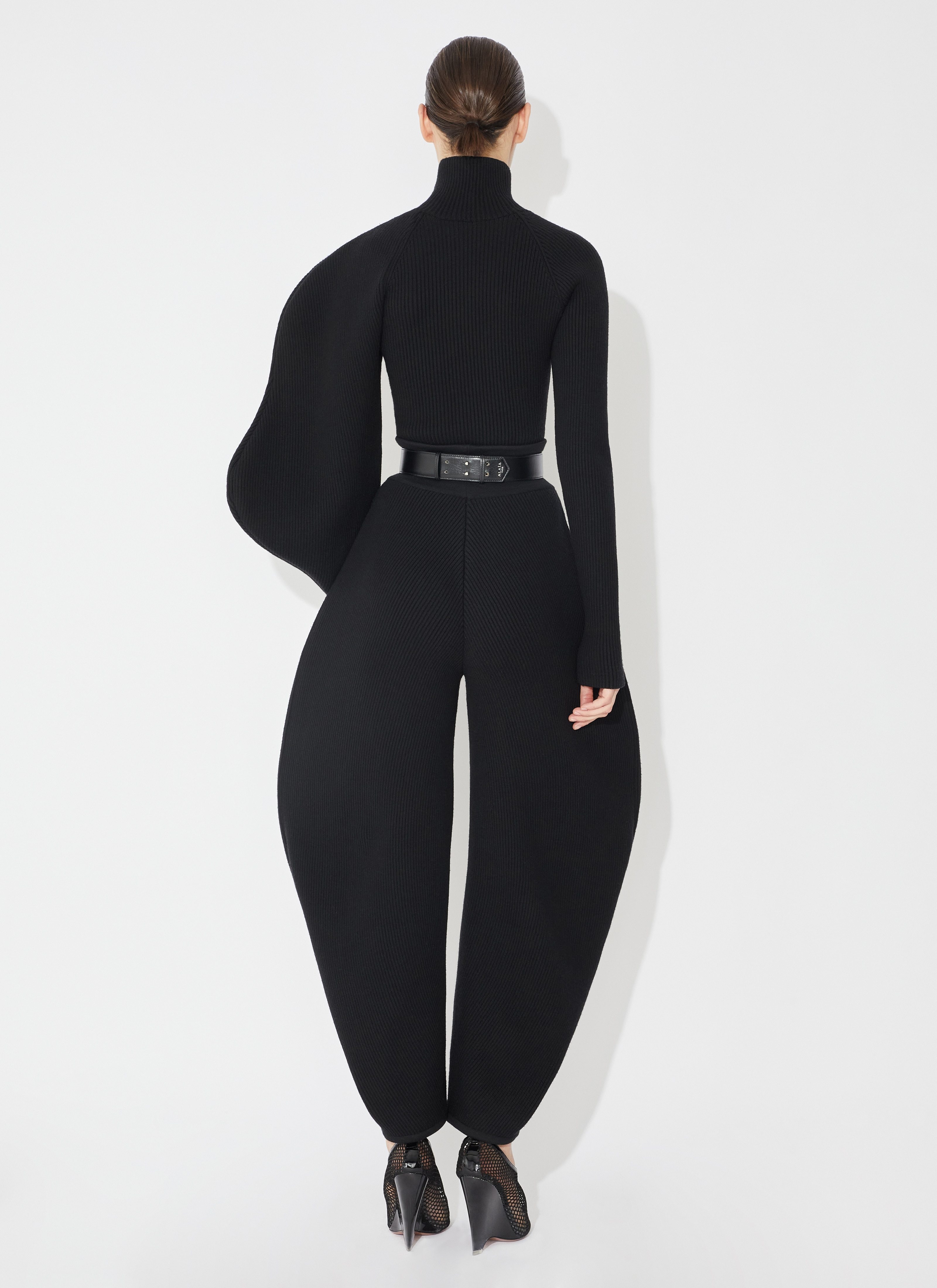 Alaïa Circular Rib Knitted Casual Pants In Black