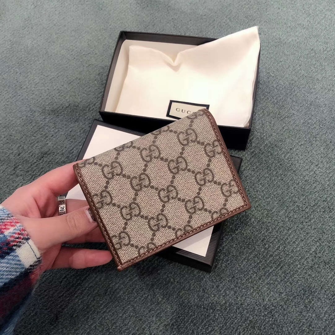 Gucci Compact Wallet With Signature Logo Pattern In Brown
