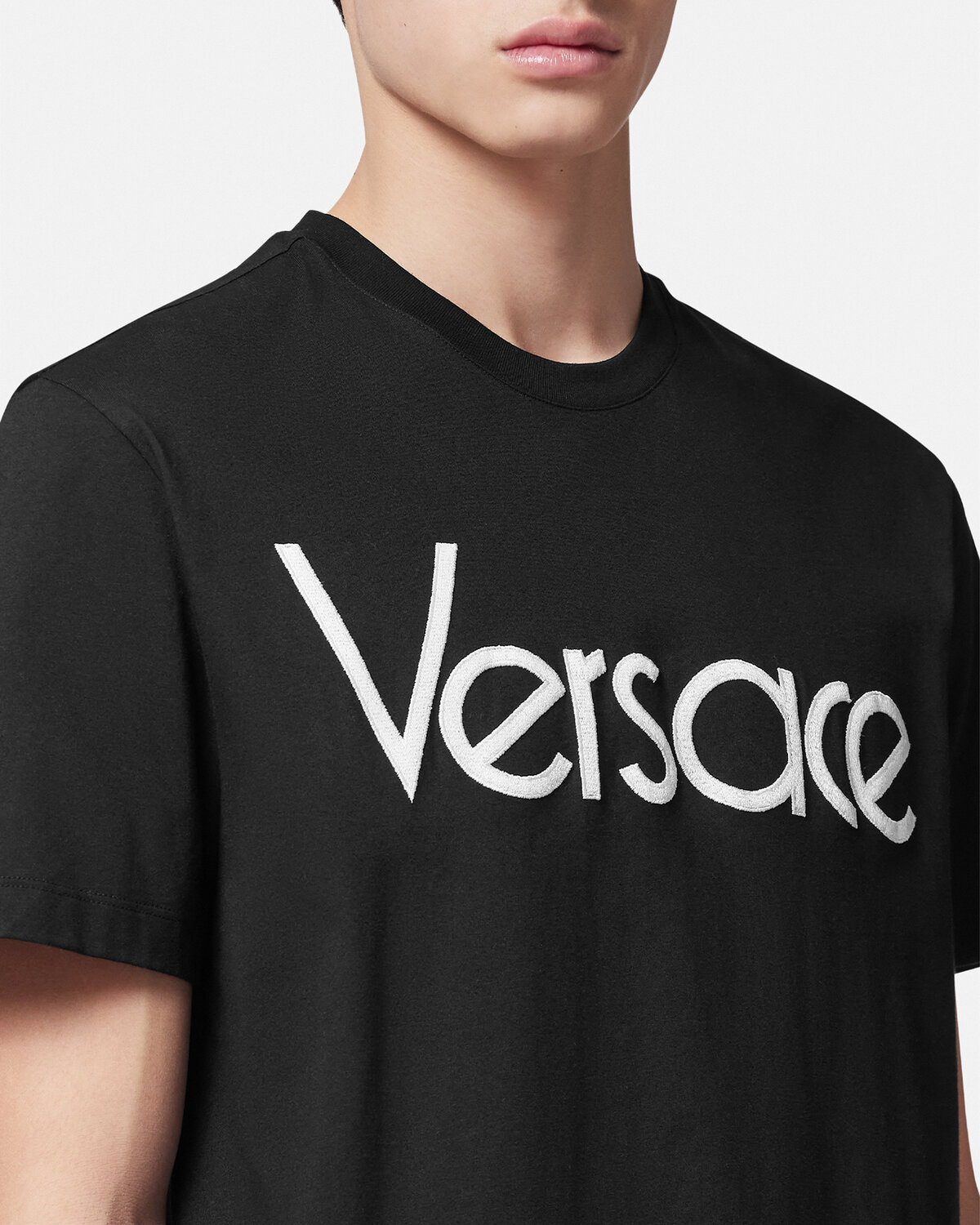 Versace Logo-embroidered Crewneck T-shirt In Black