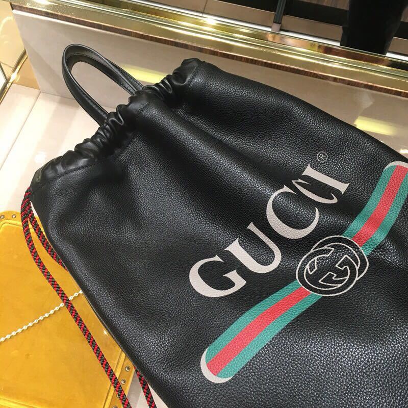 Gucci Logo Drawstring Backpack In Black