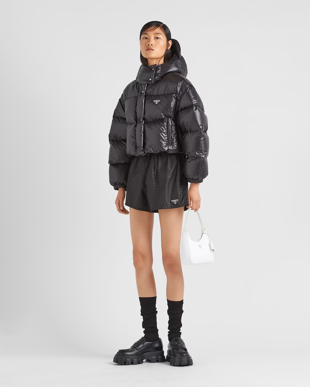 Prada Womens Black Logo-plaque Padded Cropped Shell-down Jacket In Black