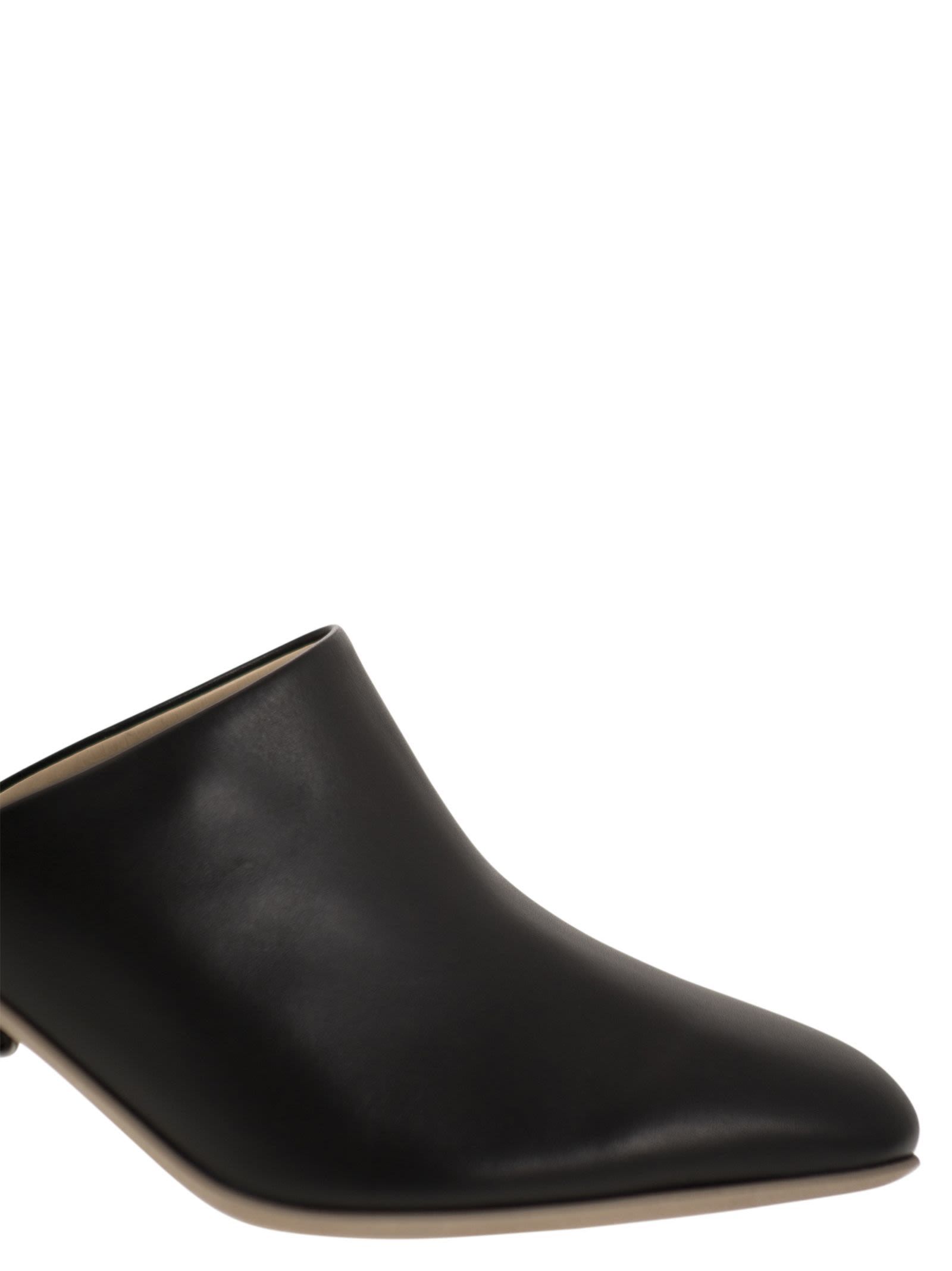 Shop Tod's 65 Leather Mules In Black