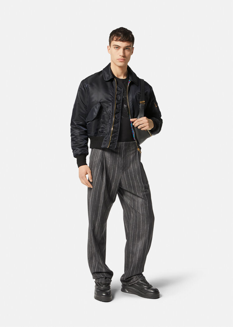 Versace Quilted Zip-up Bomber Jacket With Logo Patch In Black